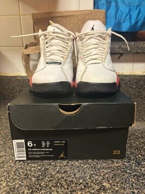Jordan White, Red and Black Retro 13s youth size 6